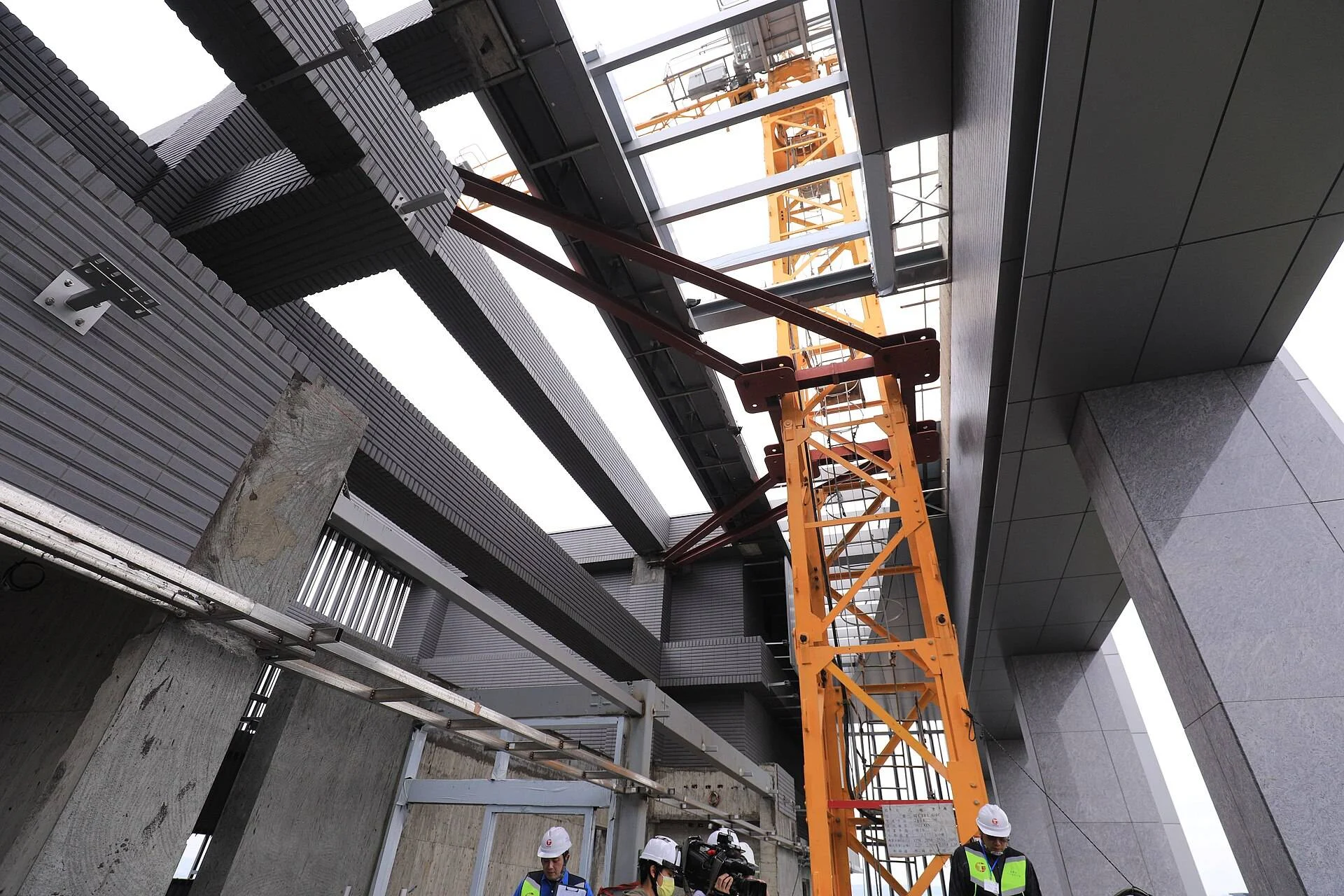 Cover: tower crane on a construction site (image source & license at end of article)